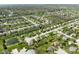 This aerial view captures a peaceful community with mature trees and manicured yards at 4625 Elkhorn Ct, Noblesville, IN 46062