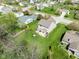 Aerial view of a spacious backyard with a patio, outdoor furniture, and a fire pit area at 4625 Elkhorn Ct, Noblesville, IN 46062