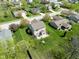 An aerial view of a private backyard with a patio seating area and manicured lawn at 4625 Elkhorn Ct, Noblesville, IN 46062