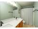 Bathroom featuring dual sinks, modern fixtures, and a bathtub with shower at 4625 Elkhorn Ct, Noblesville, IN 46062