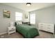 Bright bedroom featuring large window, neutral wall, and stylish decor at 4625 Elkhorn Ct, Noblesville, IN 46062