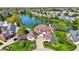 Aerial shot of a luxury home nestled in a community with a serene lake at 4726 Ellery Ln, Indianapolis, IN 46250