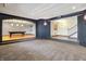 Finished basement with carpet, recessed lights, archways, hardwood flooring, and pool table at 4726 Ellery Ln, Indianapolis, IN 46250