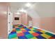 Large bonus room with unique flooring and plenty of space for activities or storage at 4726 Ellery Ln, Indianapolis, IN 46250