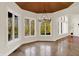 Breakfast nook featuring many windows offering natural light and backyard views, in a home with tile floors at 4726 Ellery Ln, Indianapolis, IN 46250