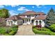 Beautiful home with a well-manicured lawn and lush landscaping that enhances the property's curb appeal at 4726 Ellery Ln, Indianapolis, IN 46250