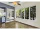 Living Space with natural light, wet bar with mirrored wall feature, and windows with backyard views at 4726 Ellery Ln, Indianapolis, IN 46250