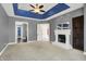 Expansive main bedroom with a tray ceiling, fireplace, and ample space at 4726 Ellery Ln, Indianapolis, IN 46250