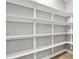 Spacious pantry with multiple levels of white shelving for ample storage space at 4726 Ellery Ln, Indianapolis, IN 46250