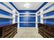Bright walk-in closet with custom shelving, drawers, and plenty of space for storage at 4726 Ellery Ln, Indianapolis, IN 46250