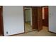 Spacious bedroom featuring neutral walls, carpet flooring, and a closet with mirrored doors at 4806 Krestridge E Ct, Bargersville, IN 46106