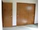 Bedroom featuring sliding door closet and door to hallway with carpet flooring at 4806 Krestridge E Ct, Bargersville, IN 46106
