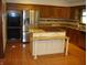 Kitchen with granite countertops, stainless steel appliances and a two-tiered kitchen island at 4806 Krestridge E Ct, Bargersville, IN 46106