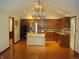 Bright kitchen featuring wood cabinetry, stainless steel appliances, and an island at 4806 Krestridge E Ct, Bargersville, IN 46106