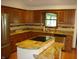 Kitchen featuring granite counters, stainless steel appliances, and a cooktop on the kitchen island at 4806 Krestridge E Ct, Bargersville, IN 46106