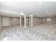 Large finished basement with neutral walls, recessed lighting and carpet with a modern leaf pattern at 5141 S Cobblestone Dr, Zionsville, IN 46077