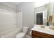 Bright bathroom featuring a tub, toilet, and vanity with mirror and a view into another room at 5141 S Cobblestone Dr, Zionsville, IN 46077