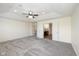 Large main bedroom with a ceiling fan and access to the ensuite bathroom and closet at 5141 S Cobblestone Dr, Zionsville, IN 46077