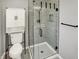 Modern bathroom with glass enclosed shower, sleek fixtures, and stylish vanity at 5354 Brendon Park Dr, Indianapolis, IN 46226