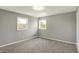 Spacious bedroom features neutral walls and carpet and plenty of natural light at 5354 Brendon Park Dr, Indianapolis, IN 46226