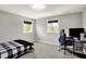 This bedroom offers plenty of room for both sleeping and a work station with a desk at 5354 Brendon Park Dr, Indianapolis, IN 46226