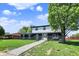 Beautiful two-story home with a well-manicured lawn and a stone walkway leading to the front door at 5354 Brendon Park Dr, Indianapolis, IN 46226
