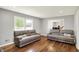 Bright living room featuring hardwood floors and comfortable, modern seating at 5354 Brendon Park Dr, Indianapolis, IN 46226
