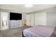 A main bedroom provides ample space, neutral decor, and an ensuite bathroom for relaxation at 5354 Brendon Park Dr, Indianapolis, IN 46226