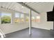 Bright sunroom featuring multiple windows providing ample natural light and a neutral color palette at 5354 Brendon Park Dr, Indianapolis, IN 46226