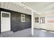 Covered patio with brick wall, exterior door, and windows to let the sunshine in at 5354 Brendon Park Dr, Indianapolis, IN 46226