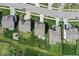 Aerial view of homes on a block in a beautiful neighborhood with grass and mature trees and professional landscaping at 5363 Citadel Dr, Noblesville, IN 46062