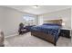 Bedroom featuring carpet, large window, bed, and space for desk at 5363 Citadel Dr, Noblesville, IN 46062