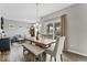Dining area with wood table set, bench, and sliding glass doors to outdoor space at 5363 Citadel Dr, Noblesville, IN 46062