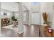Bright foyer with hardwood floors leads to a spacious office; front door with transom window at 5363 Citadel Dr, Noblesville, IN 46062
