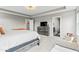 Large carpeted main bedroom with tray ceiling, neutral paint, closet, and adjoining bath at 5363 Citadel Dr, Noblesville, IN 46062