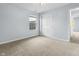 Bedroom boasts neutral carpet, a double closet, and natural light at 5465 Tanglewood Ln, Whitestown, IN 46075