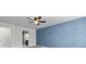 This bedroom features a modern accent wall, neutral carpet, and ample natural light at 5465 Tanglewood Ln, Whitestown, IN 46075