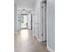Bright entryway with neutral tile flooring, open doorway, and white trim at 5465 Tanglewood Ln, Whitestown, IN 46075