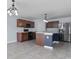 Kitchen with stainless steel appliances, center island, and ample cabinet space in a modern home at 5465 Tanglewood Ln, Whitestown, IN 46075