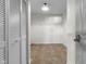 Spacious walk-in closet featuring vinyl flooring, shelving, and a convenient light fixture at 5465 Tanglewood Ln, Whitestown, IN 46075