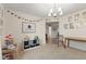 Brightly lit space with a large window, carpeted floors, and plenty of natural light at 5845 Cresswell Ln, Whitestown, IN 46075
