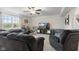 Spacious living room with carpet, a ceiling fan, and an abundance of comfortable seating at 5845 Cresswell Ln, Whitestown, IN 46075