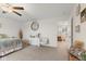 Bedroom featuring a ceiling fan, white dresser, and a view into another room at 5845 Cresswell Ln, Whitestown, IN 46075