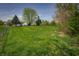 Expansive grassy backyard providing plenty of room for recreation at 6209 Amber Valley Ln, Indianapolis, IN 46237
