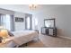 Bedroom with carpet, lots of natural light, and a dresser, creating a tranquil and inviting space at 6229 Farlin Dr, Whitestown, IN 46075