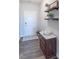 Welcoming foyer with hardwood floors, a decorative chest, and stylish wall decor at 6229 Farlin Dr, Whitestown, IN 46075