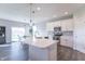 Bright, modern kitchen with white cabinets, stainless steel appliances, and an island at 6229 Farlin Dr, Whitestown, IN 46075