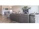 Spacious living area showcasing a sectional sofa, recliner, and entertainment setup at 6229 Farlin Dr, Whitestown, IN 46075