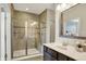 Modern bathroom features a glass-enclosed shower with tiled walls and modern vanity at 6241 Colonial Dr, Whitestown, IN 46075