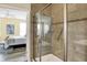 Modern bathroom with shower and bedroom view at 6241 Colonial Dr, Whitestown, IN 46075
